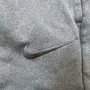 Nike therma-fit sweatpants; pre-worn; medium with drawstrings.